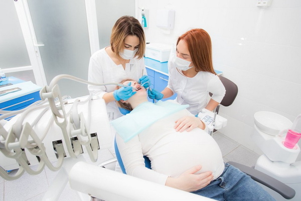 Лечение зубов в период беременности